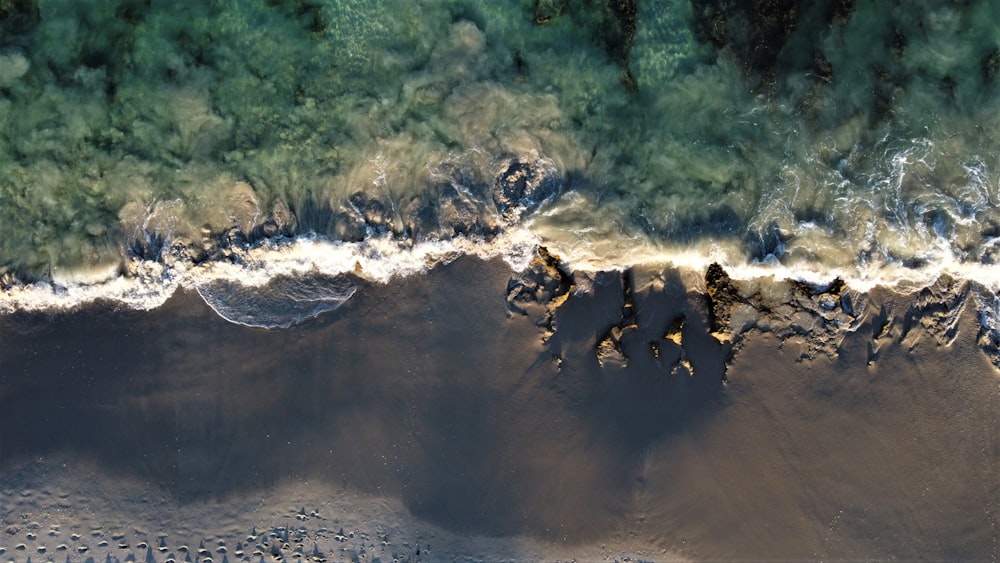 an aerial view of a beach and ocean