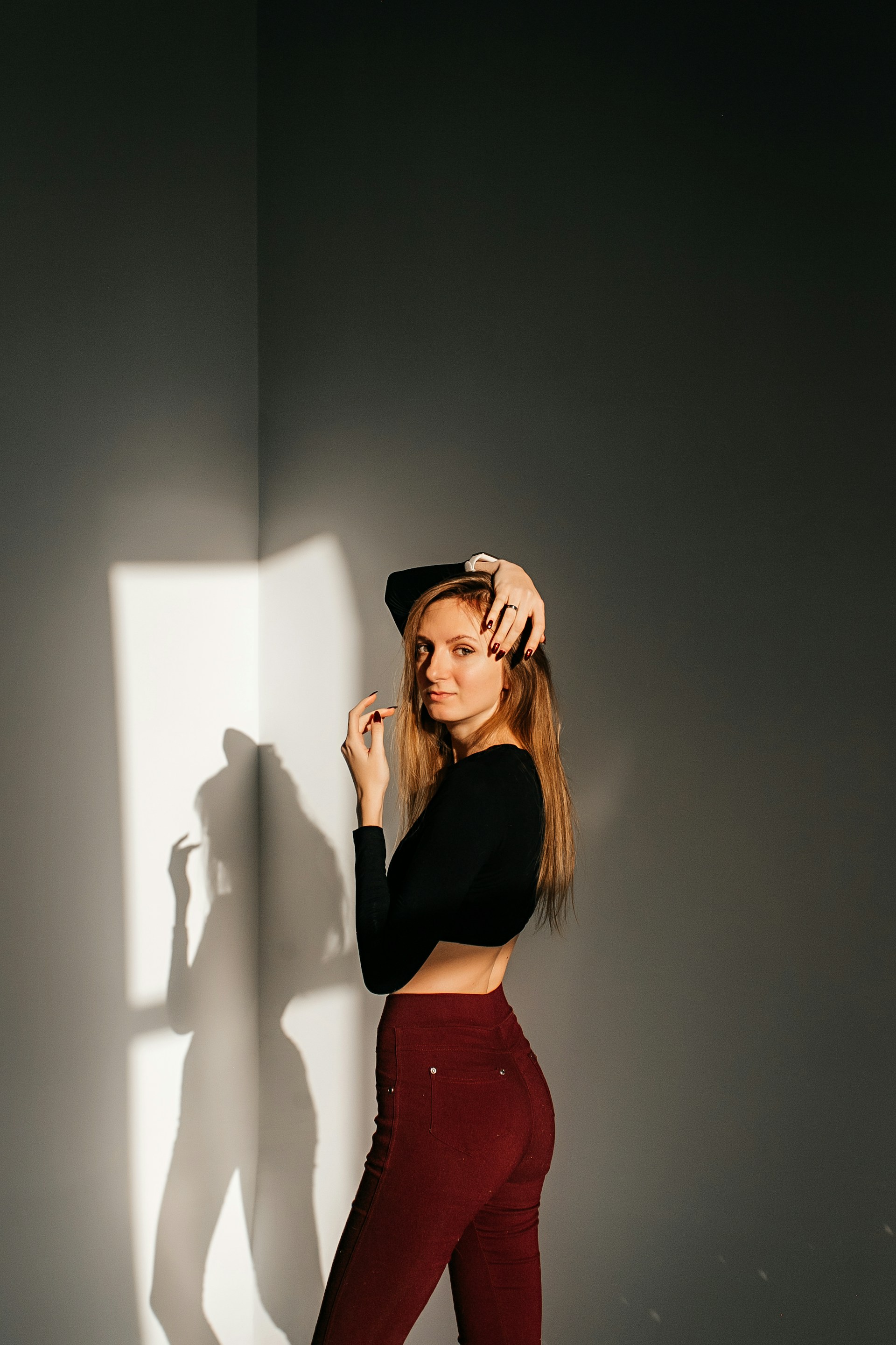 woman holding dried flower
