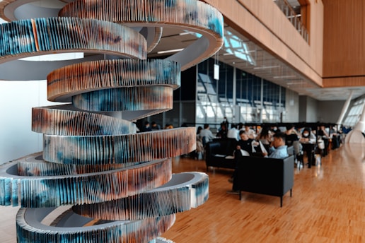 A contemplative sculpture by Anurag K. Gupta, capturing spirals of consciousness in a serene gallery space.