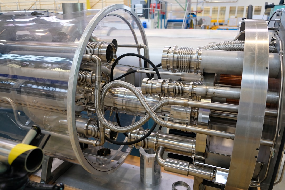 a machine that has a lot of pipes inside of it, CERN. The future of particle physics: A factory constructing the Large H
