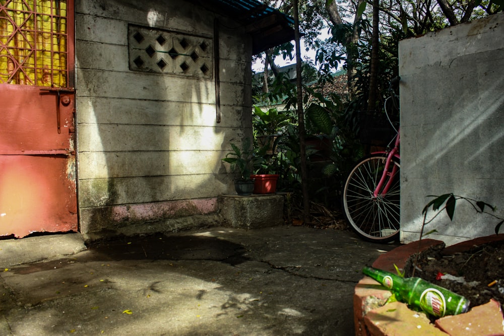 a bicycle is parked outside of a house