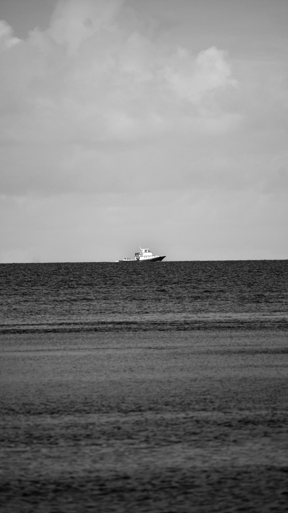 a large boat in the middle of a large body of water