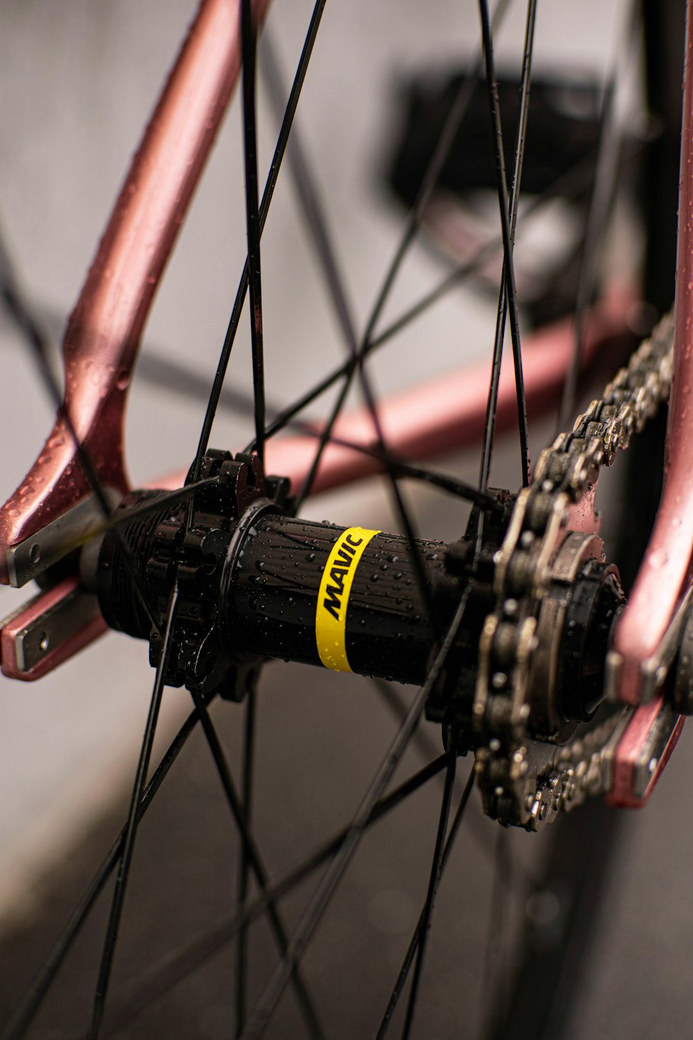 a close up of the spokes of a bicycle