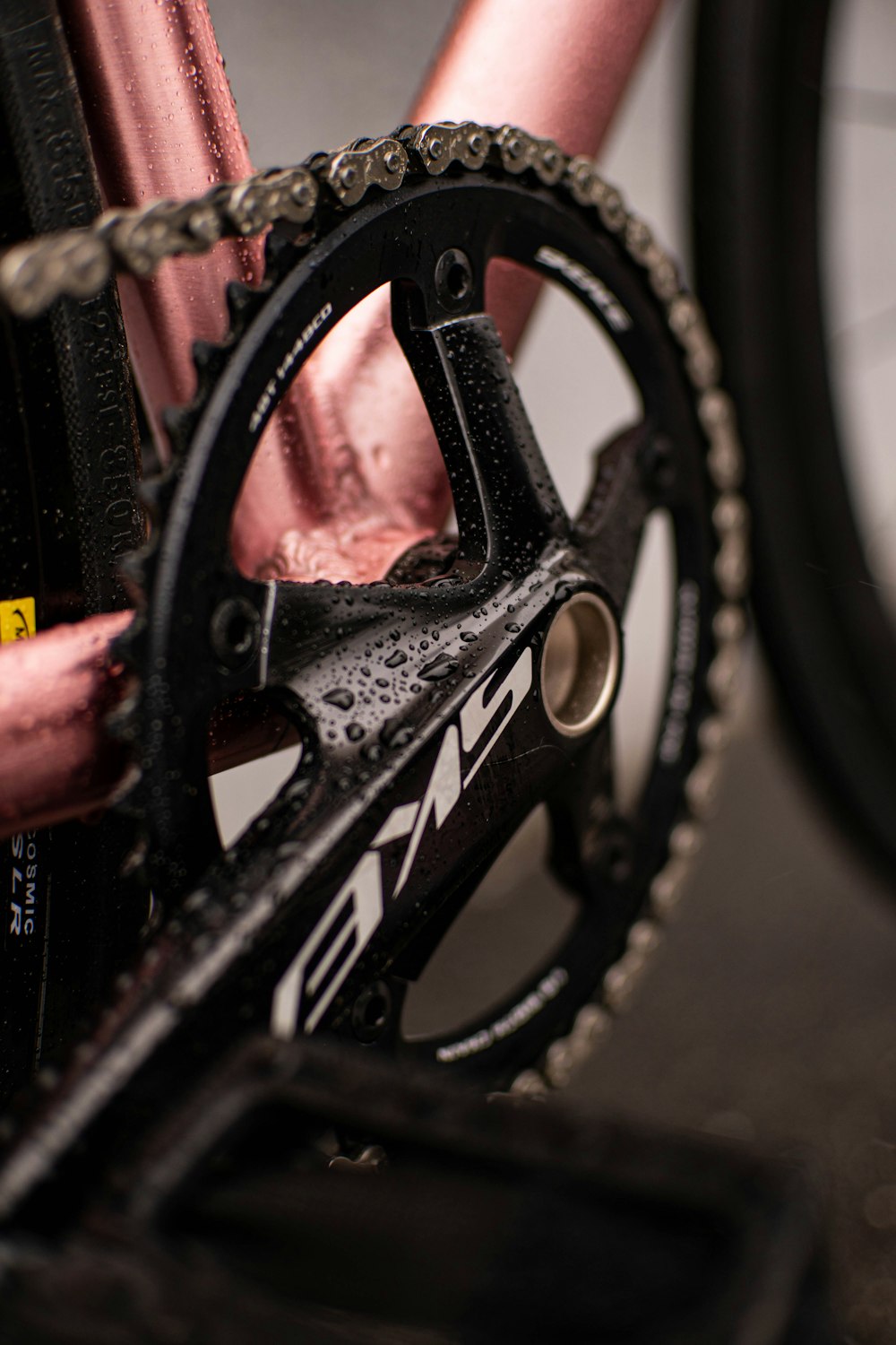 a close up of a bike chain and gear