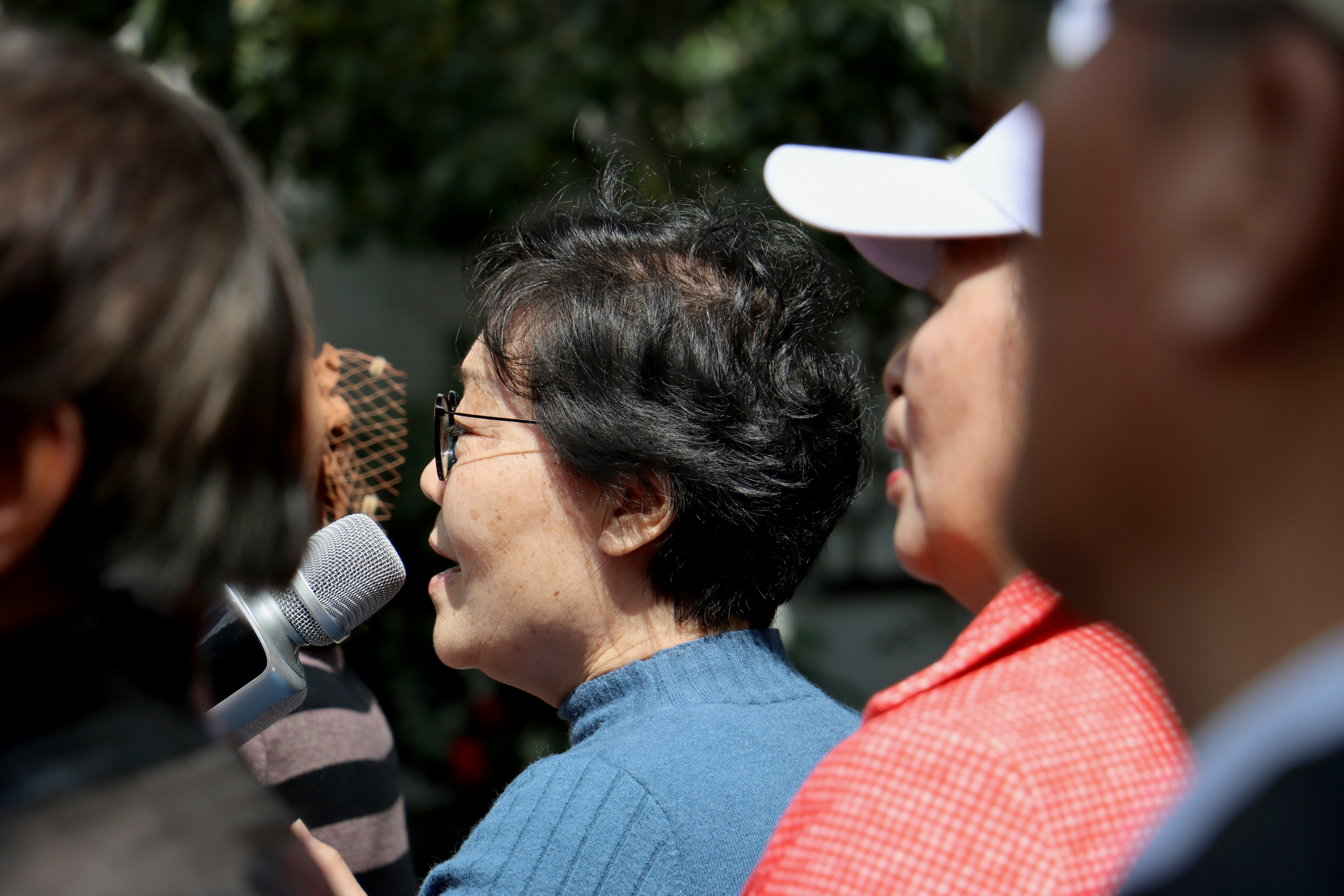 A close-up shot of Sonam Wangchuk speaking at a press conference, looking earnest and reflective.