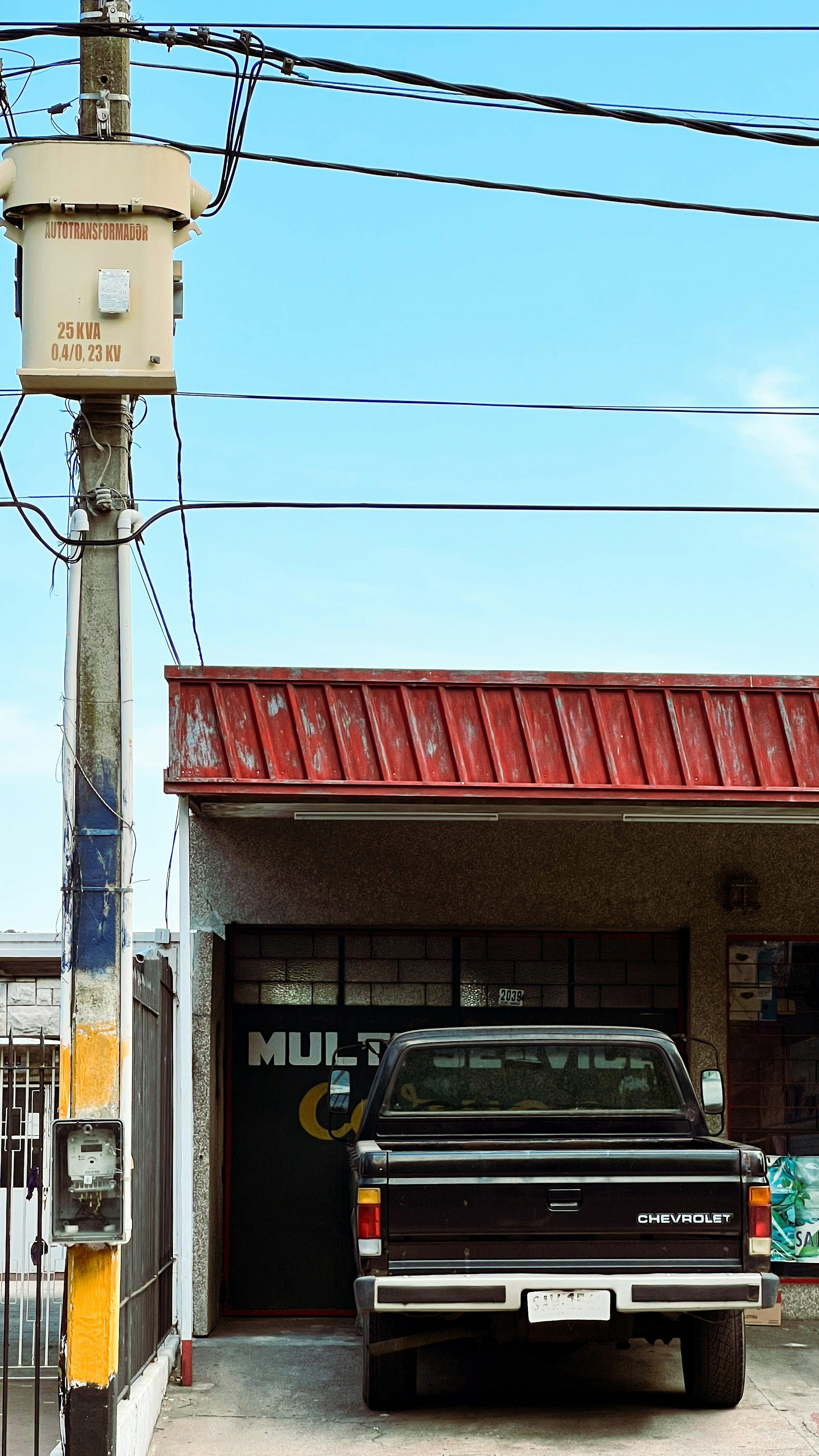 a truck is parked in front of a building