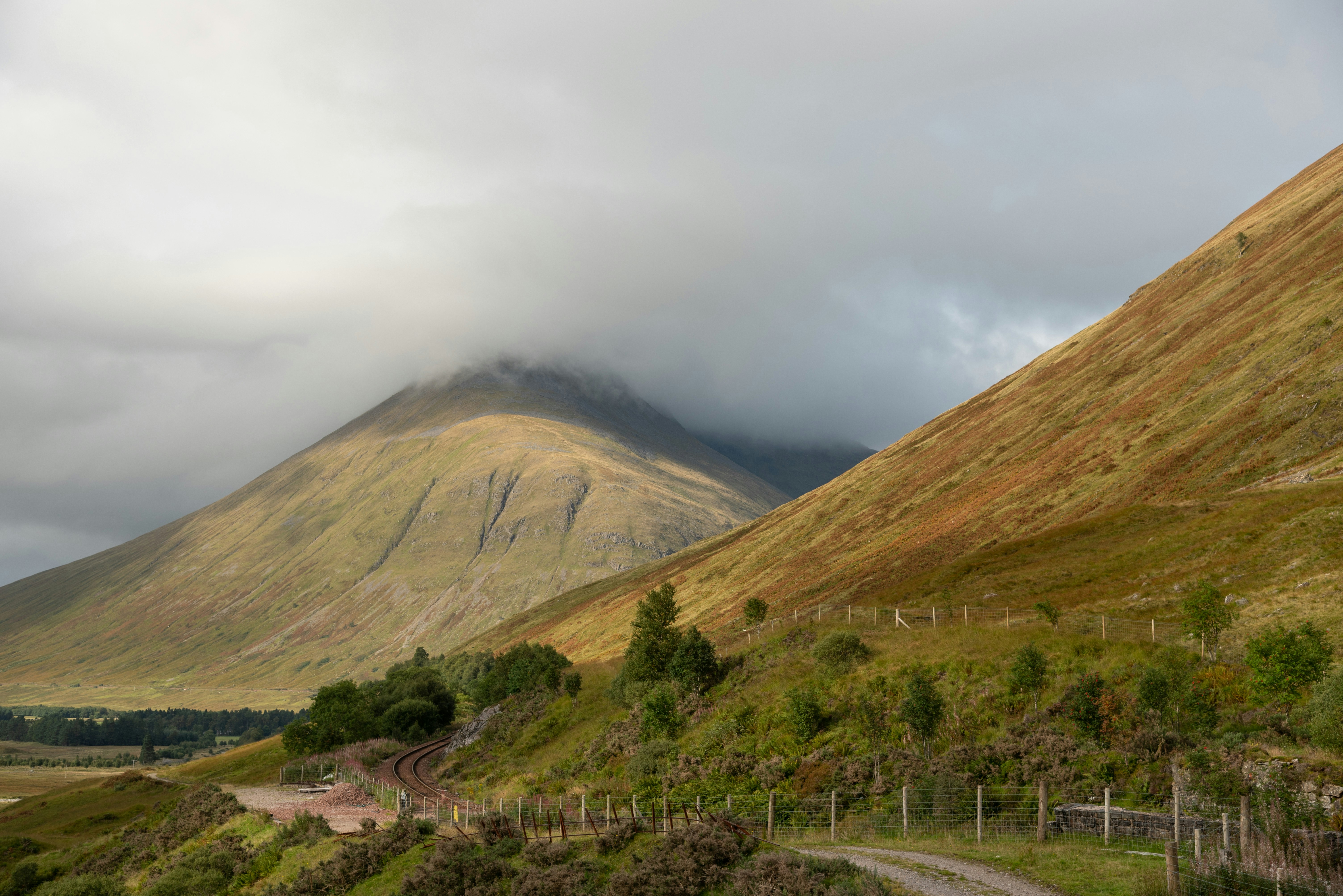 a mountain with a road going through it