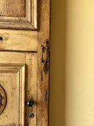 Close-up of a wooden door with natural grain texture in a modern home setting