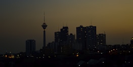 City skyline at dusk symbolizing global financial connections.