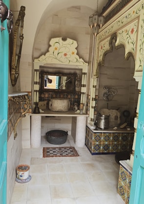 Traditional Moroccan bath setup highlighting steam and ornate decor
