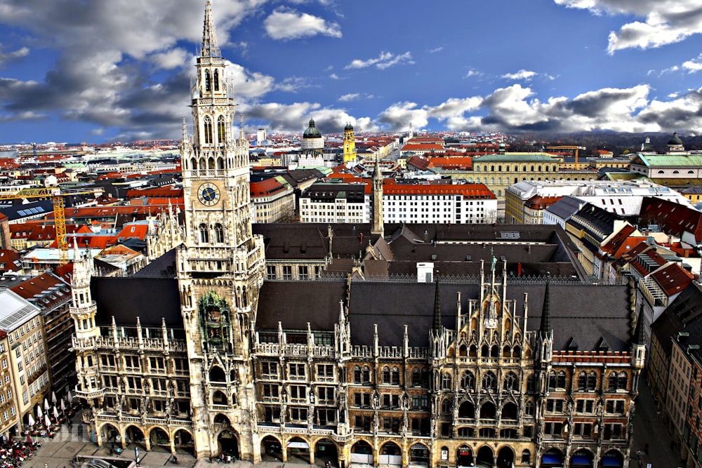 an aerial view of a city with a clock tower