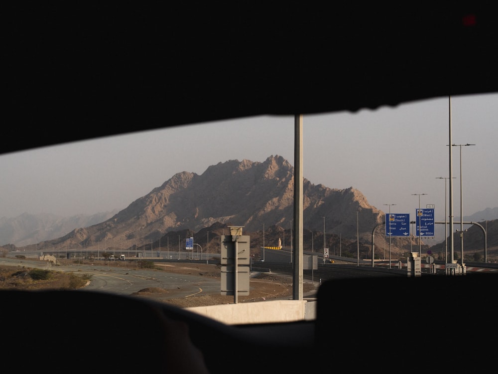 a view from inside a car of a mountain range