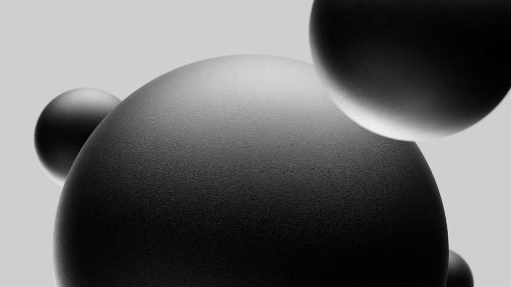 a black and white photo of some balls