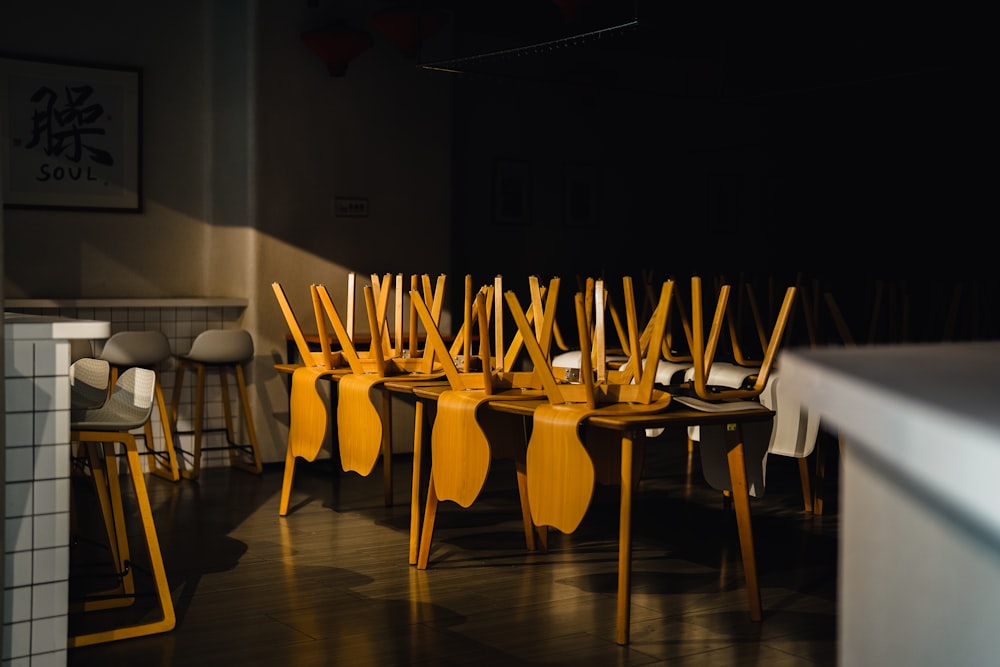 a row of yellow chairs sitting next to each other