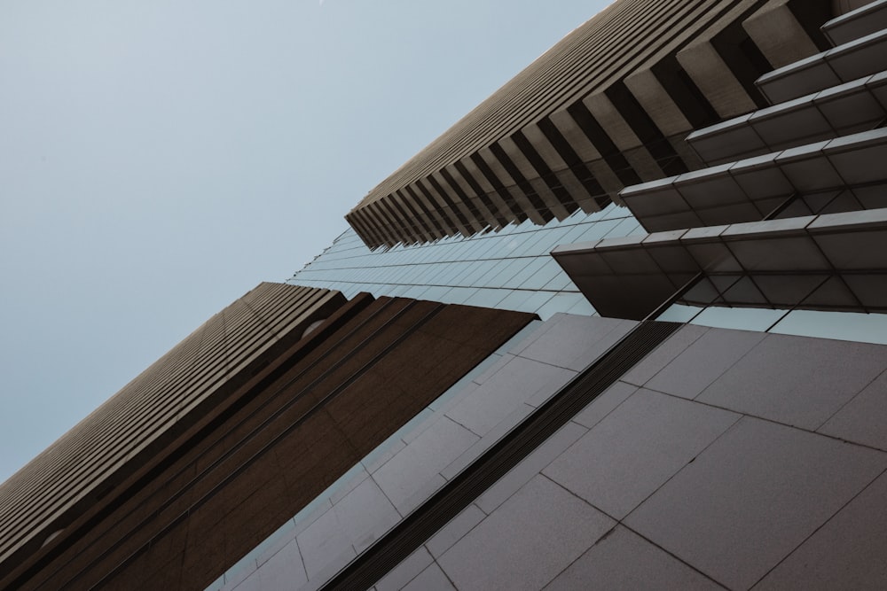 a tall building with a sky in the background