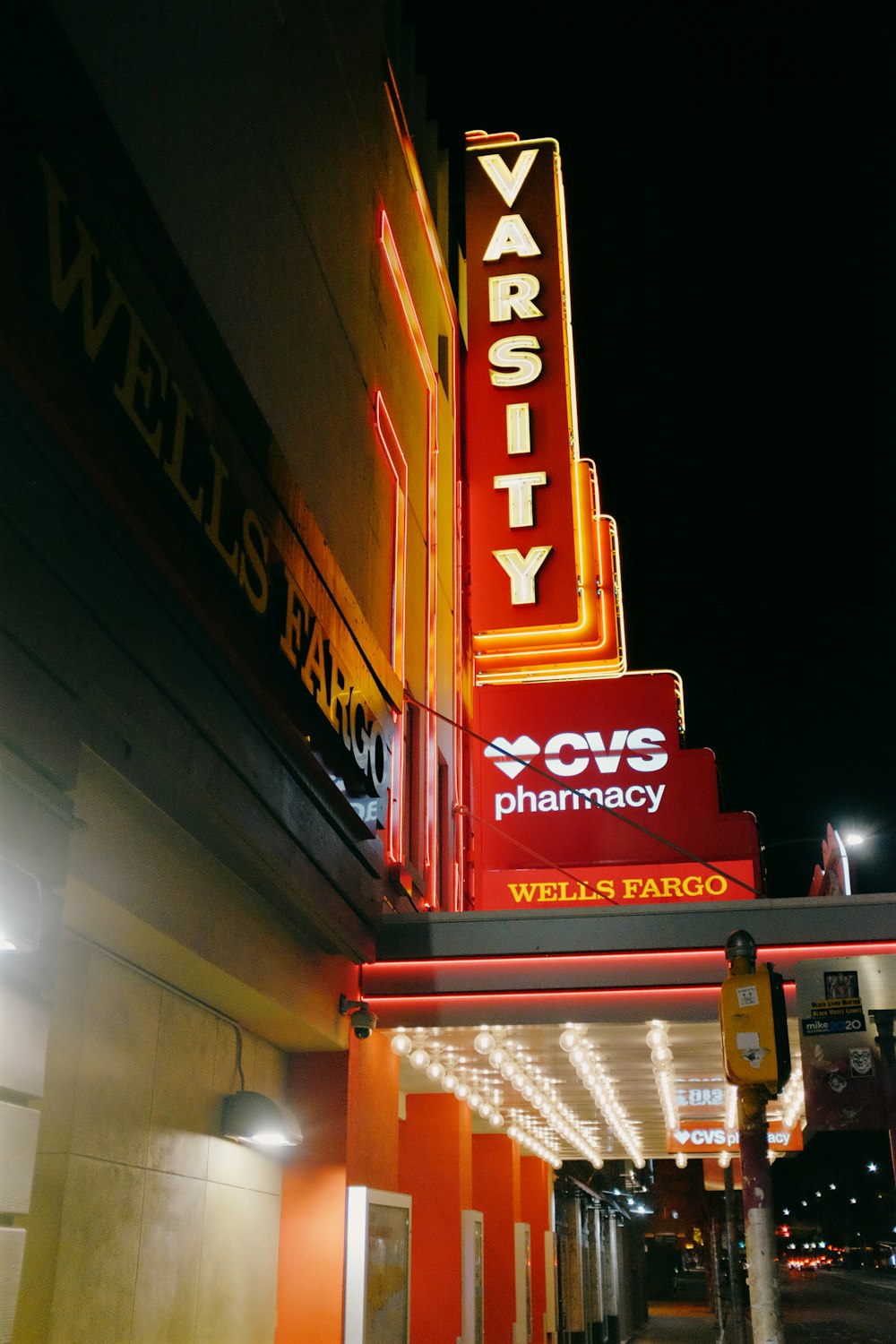 a neon sign on the side of a building