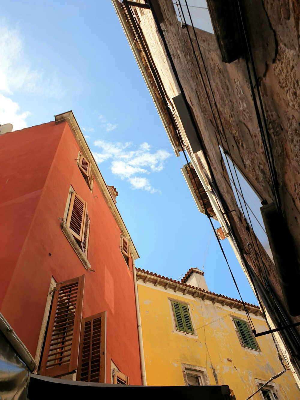 a view of a building from the ground looking up