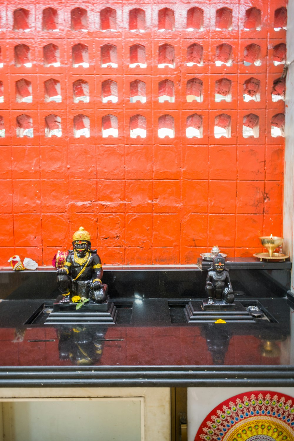 a couple of figurines sitting on top of a counter