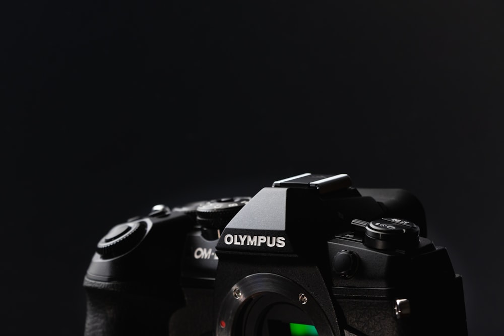 a close up of a camera on a black background