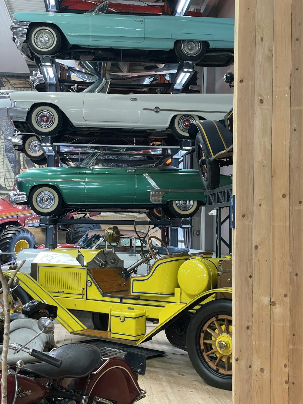 a room filled with lots of different types of cars