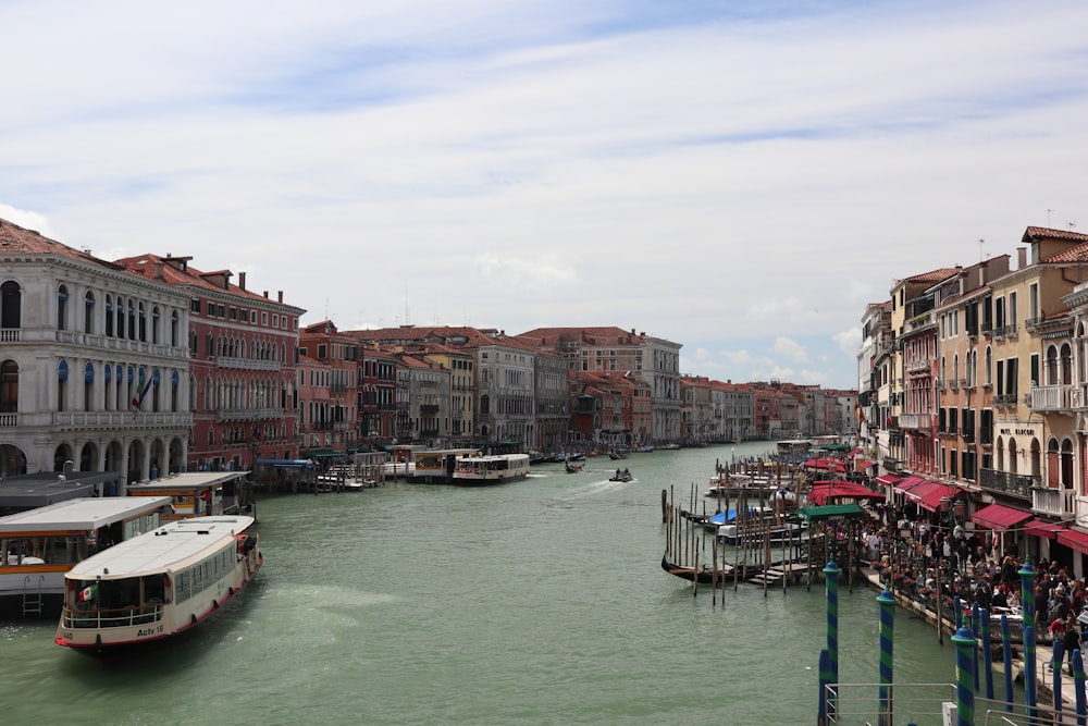 a river running through a city next to tall buildings