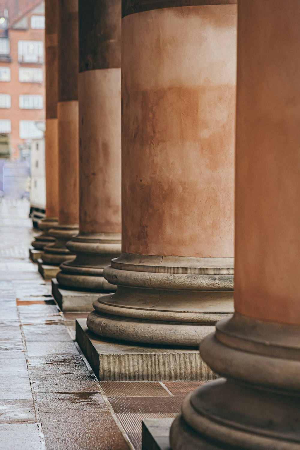 a row of stone pillars sitting next to each other