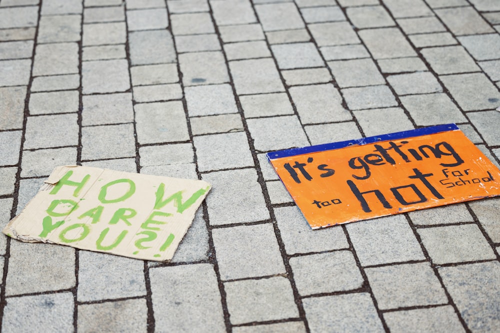 a couple of signs that are on the ground