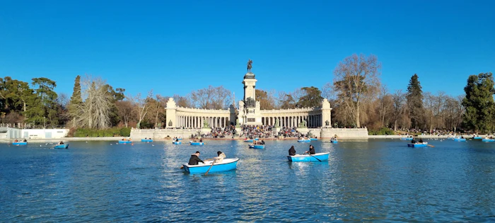 Rowing boats on the lake at Retiro Park, Madrid, Spain