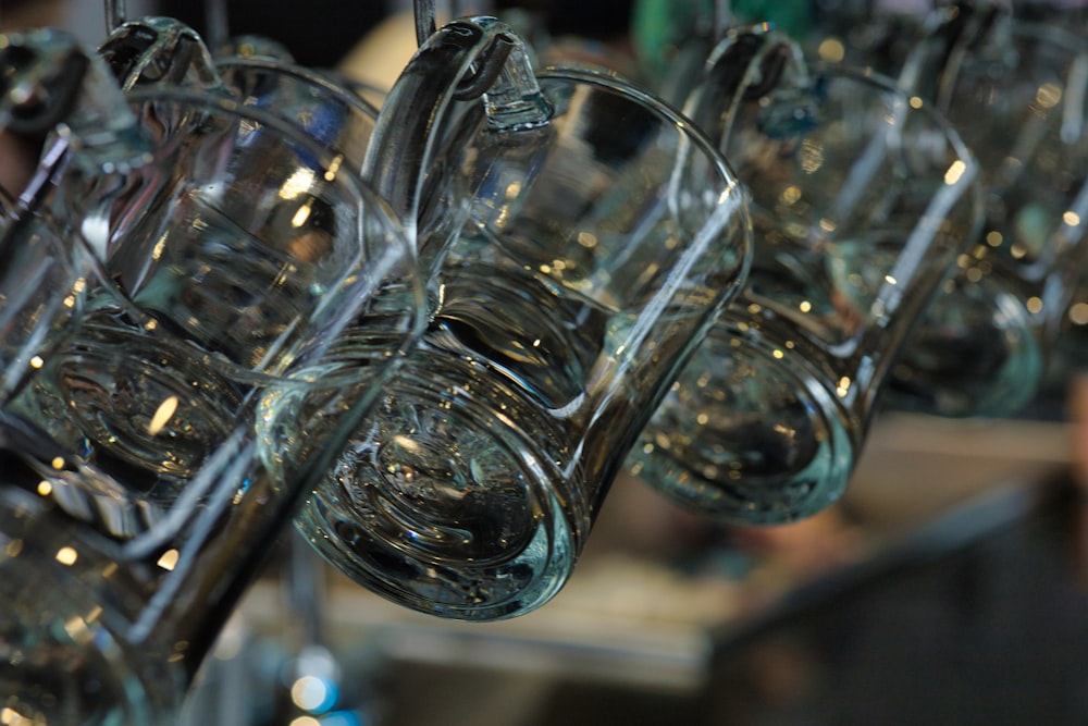 a group of wine glasses sitting on top of a table