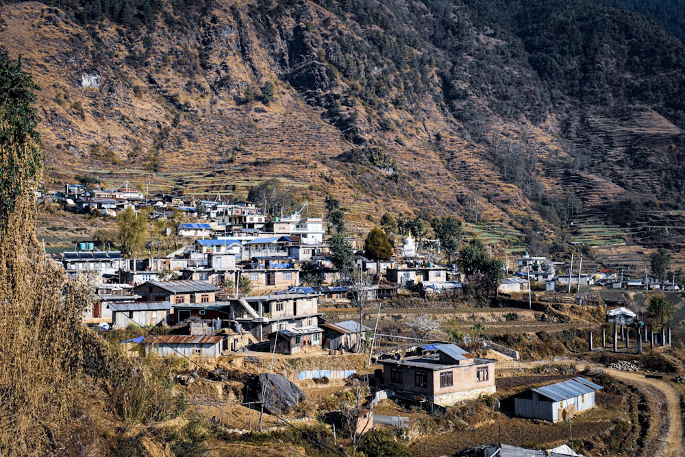 a village in the middle of a mountain range