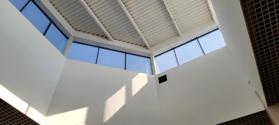 Wide view of a modern office with newly installed suspended ceilings.