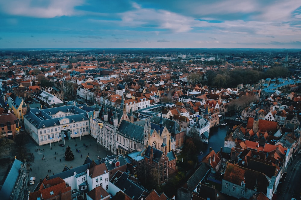 an aerial view of a city with many buildings