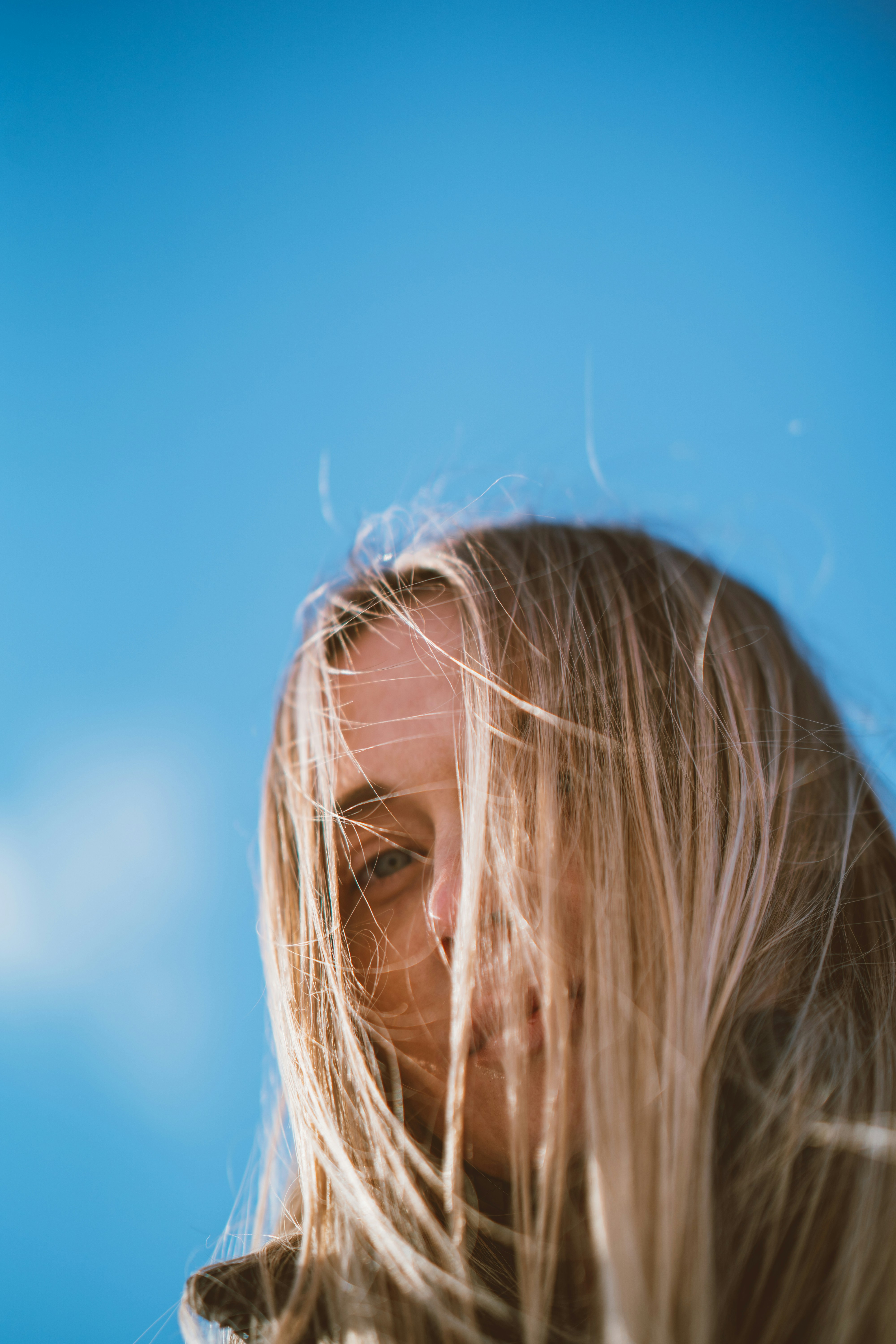 a close up of a person with long hair