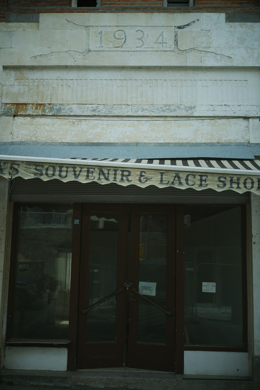 an old building with a sign on the front of it