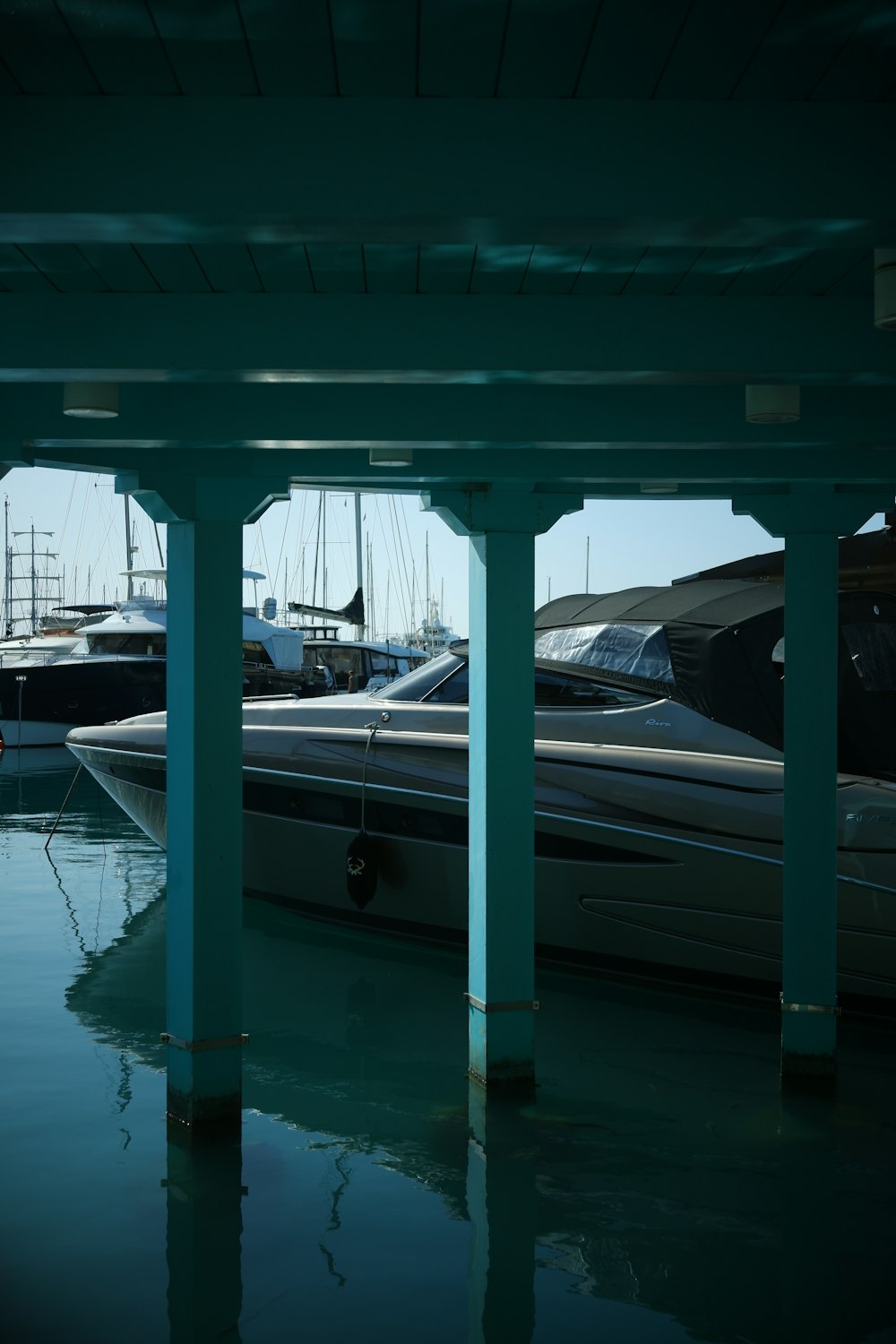 a group of boats that are sitting in the water