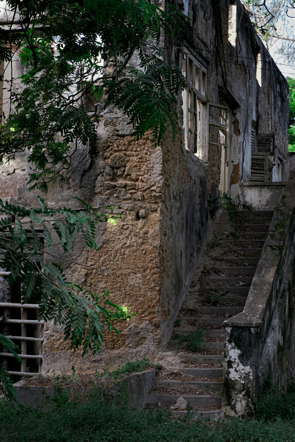 a stone building with steps leading up to it