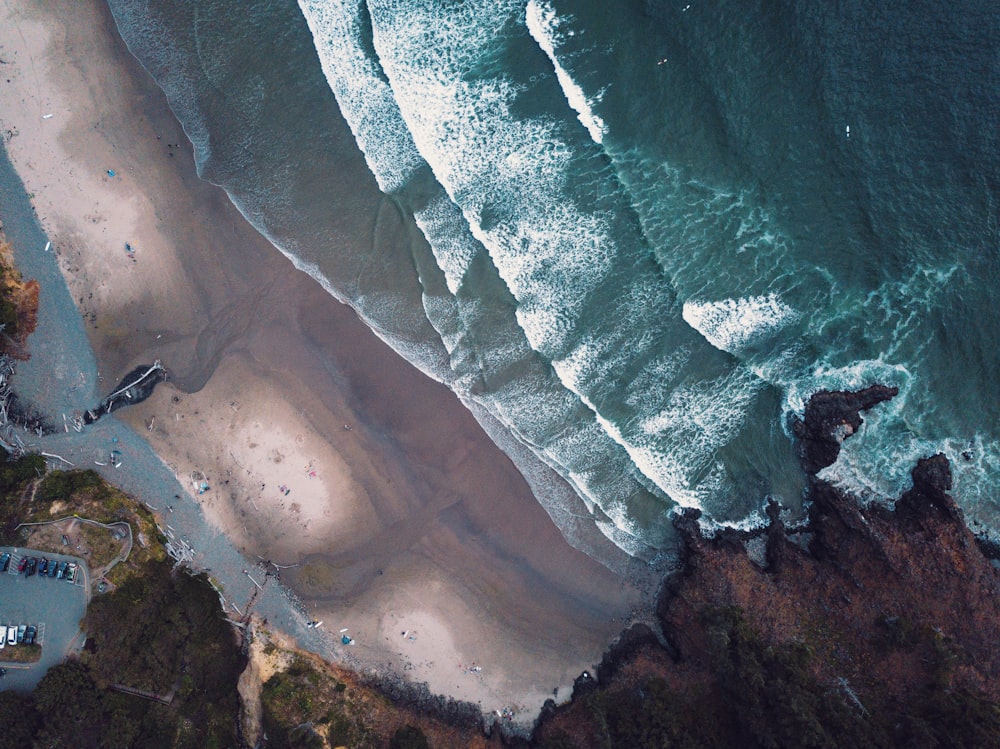 an aerial view of a beach and ocean