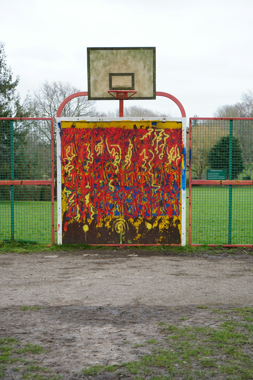 a basketball court with a painting on it