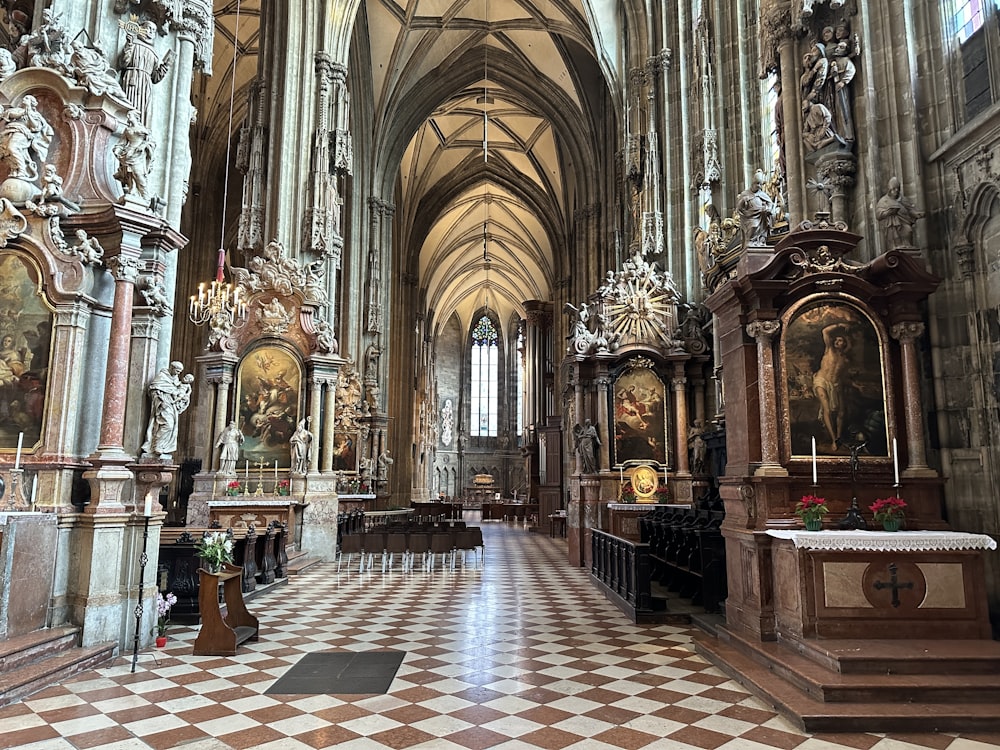 a large cathedral with a checkered floor and high ceilings