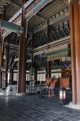 a large building with columns and a lantern in the middle of it
