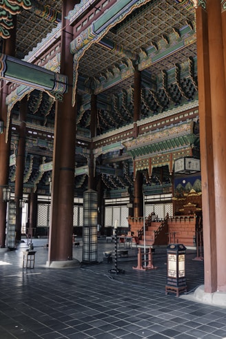 a large building with columns and a lantern in the middle of it