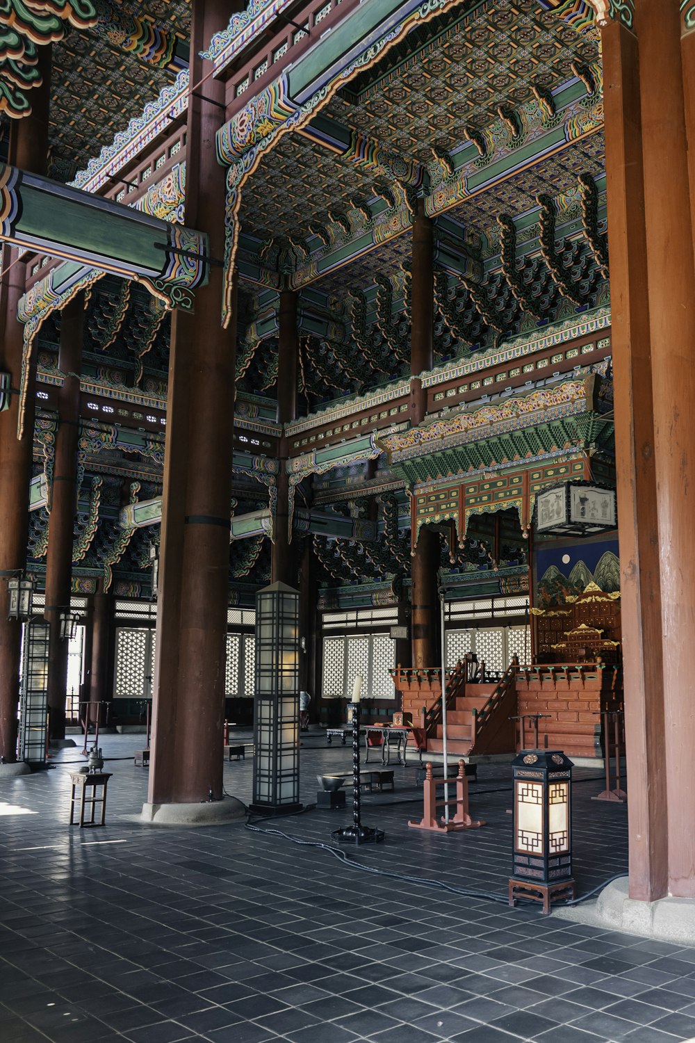 a large building with columns and a lantern in the middle of it