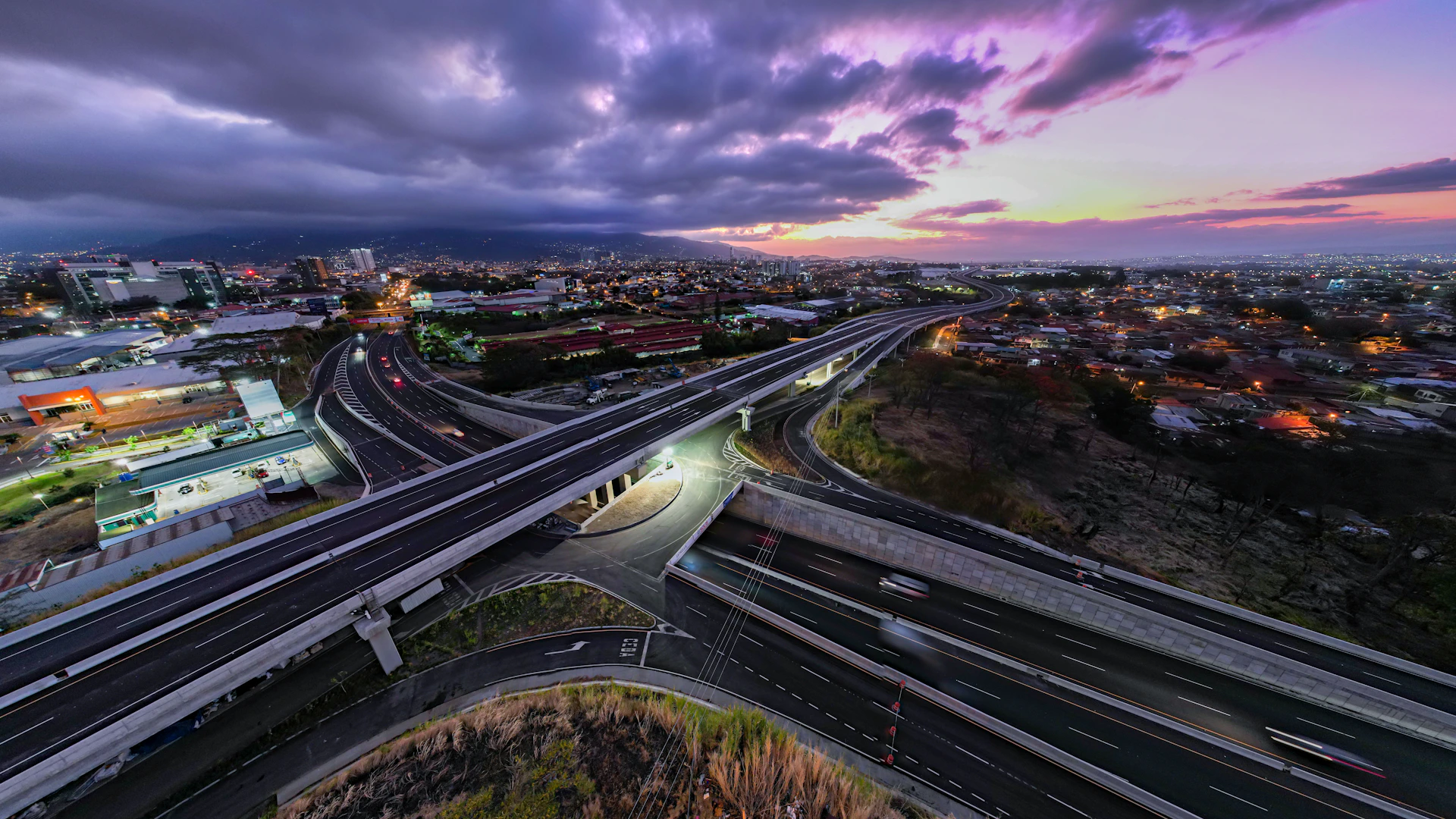 woman wearing yellow long-sleeved dress under white clouds and blue sky during daytime