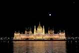 Night view of the faculty of medicine illuminated softly.