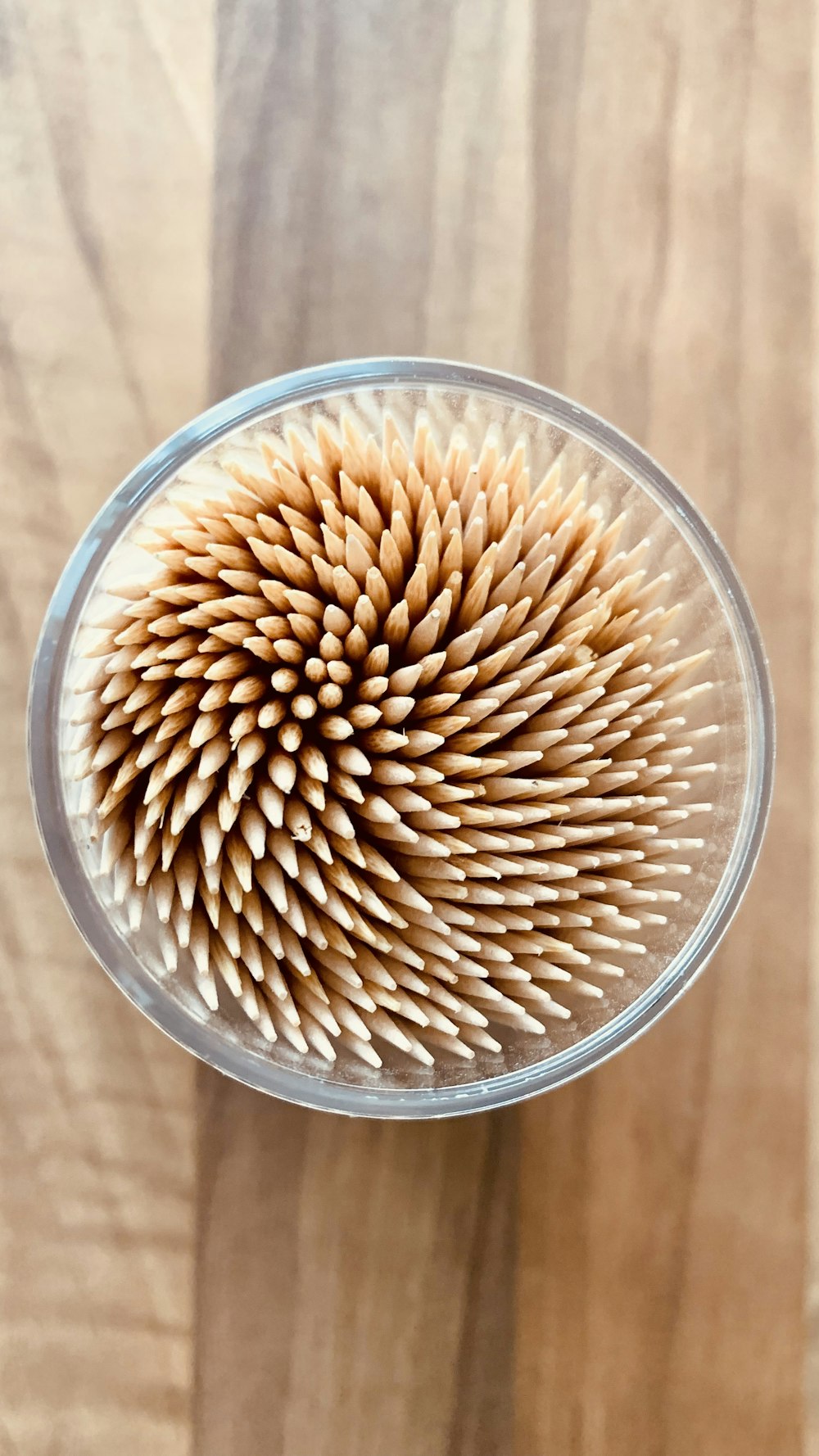 a close up of a glass with a straw in it