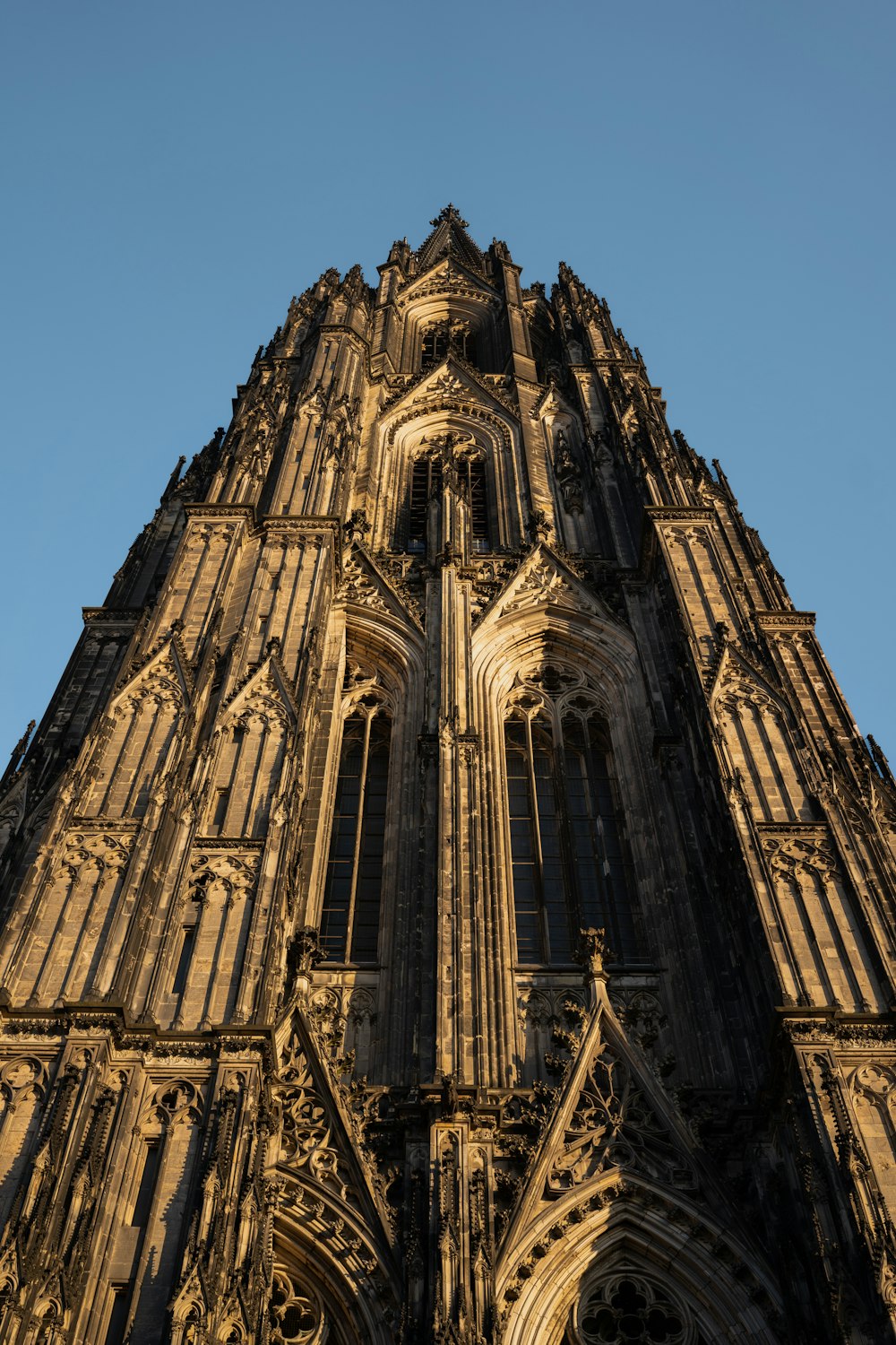 a very tall building with a clock on it's side