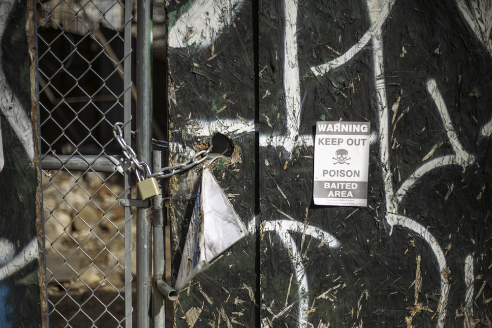 a close up of a door with graffiti on it