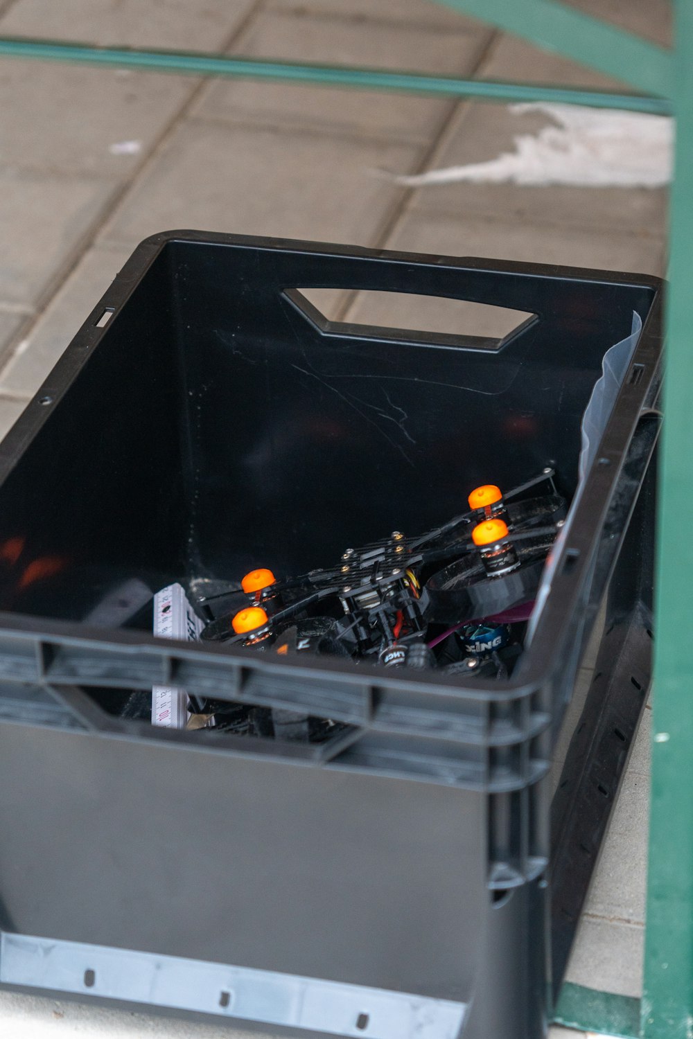 a black box filled with lots of assorted items