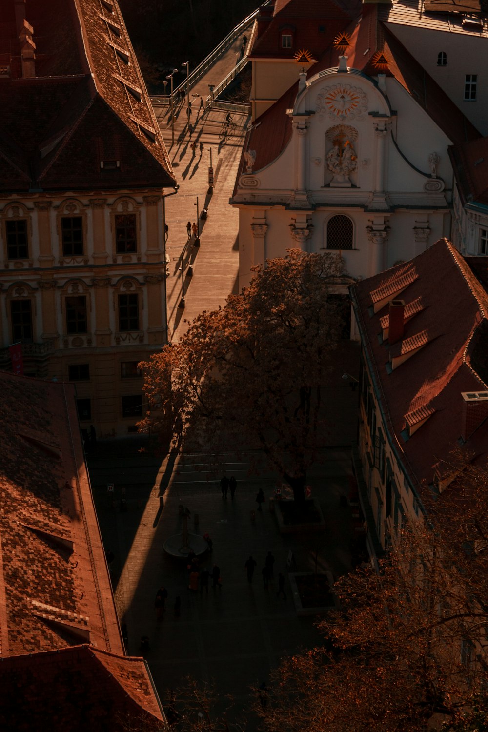 an aerial view of a city with a clock tower