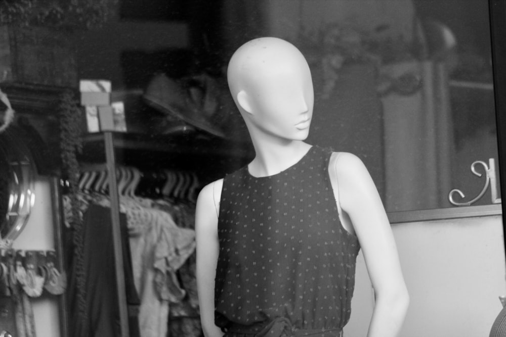 a black and white photo of a mannequin's head